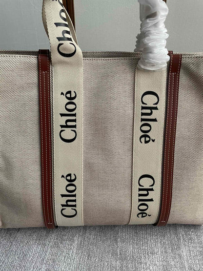 LAGRE STRAP WOODY TOTE BAG 45 IN BEIGE LINEN CANVAS BLACK WEBBING LOGO EMBROIDER BROWN CALFSKIN