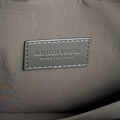INTRECCIATO CLUTCH 26 IN CORDUROY GRAY CALFSKIN