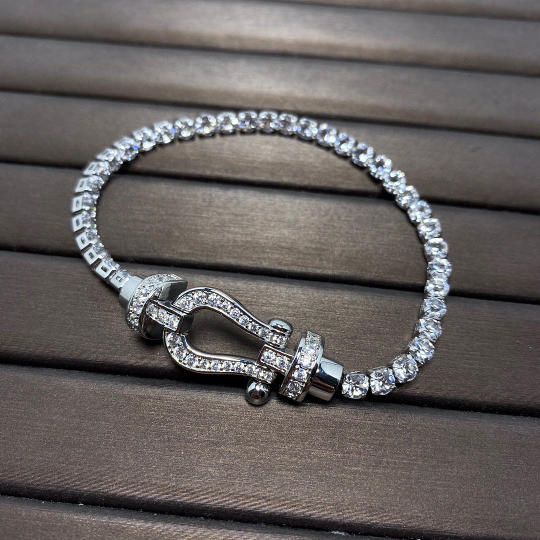 [AURORA]FORCE GROSSES HUFEISEN-TENNISARMBAND MIT VOLLEN DIAMANTEN 