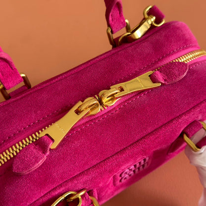 ARCADIE BAG 22 IN FUCHSIA SUEDE GOLD HARDWARE