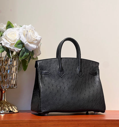 KELLY SELLIER 25 BAG IN BLACK OSTRICH LEATHER WITH GOLD HARDWARE (MADE-TO-ODER)